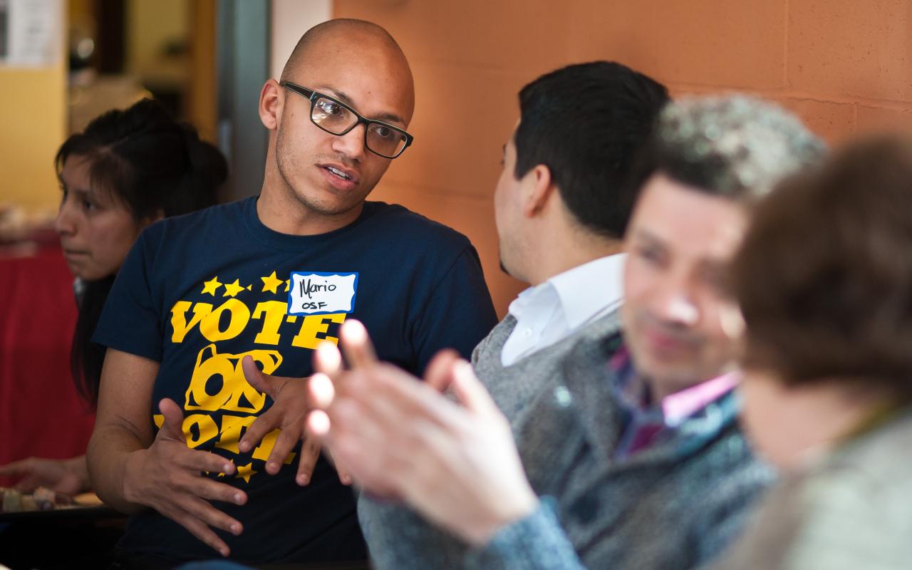 Mario Parker-Milligan of the Oregon Student Association discusses the Meyer Memorial Trust's new, equity-focused grant-making approach at an information session hosted by a Latino labor union.