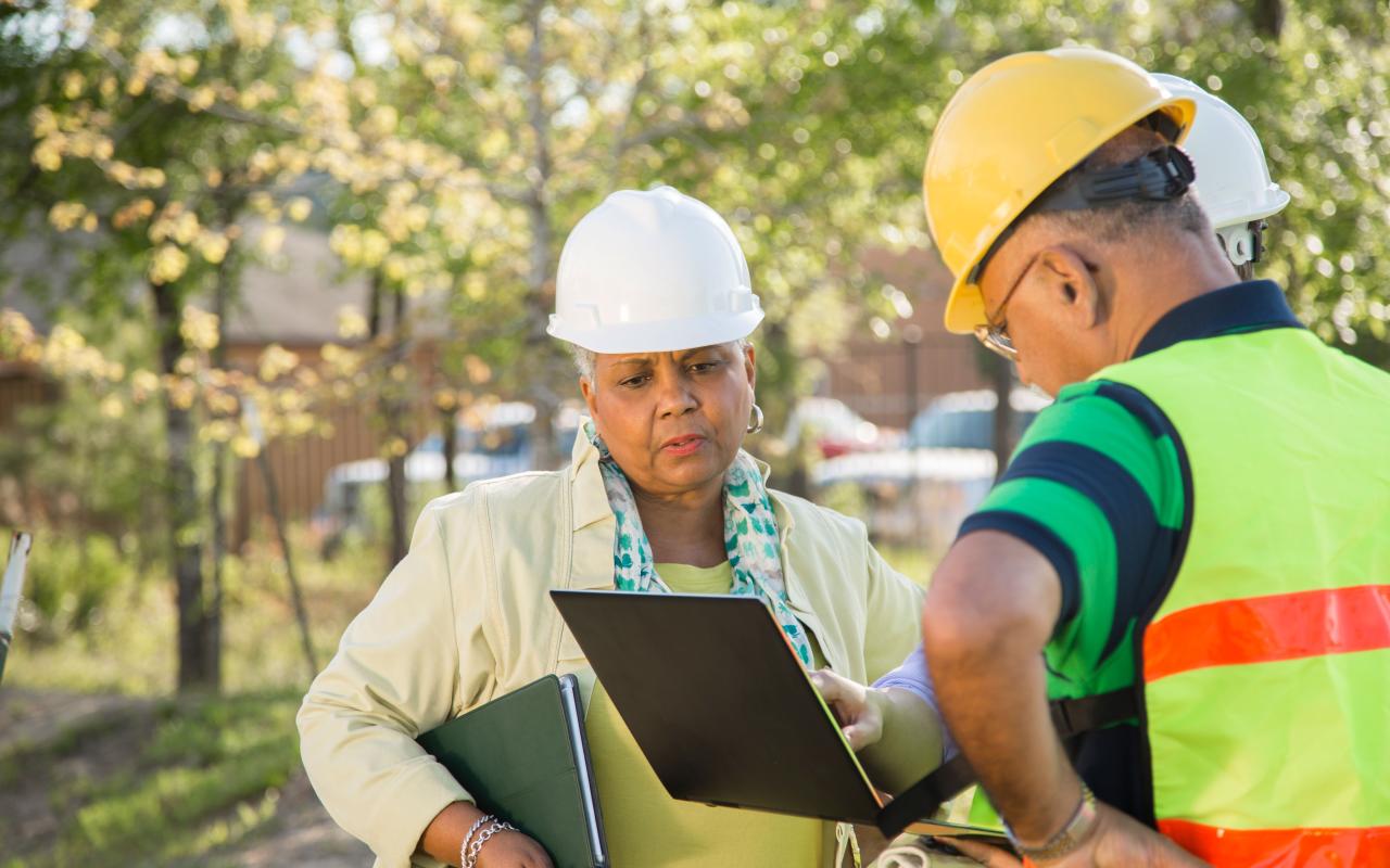 A photograph of contractors. 