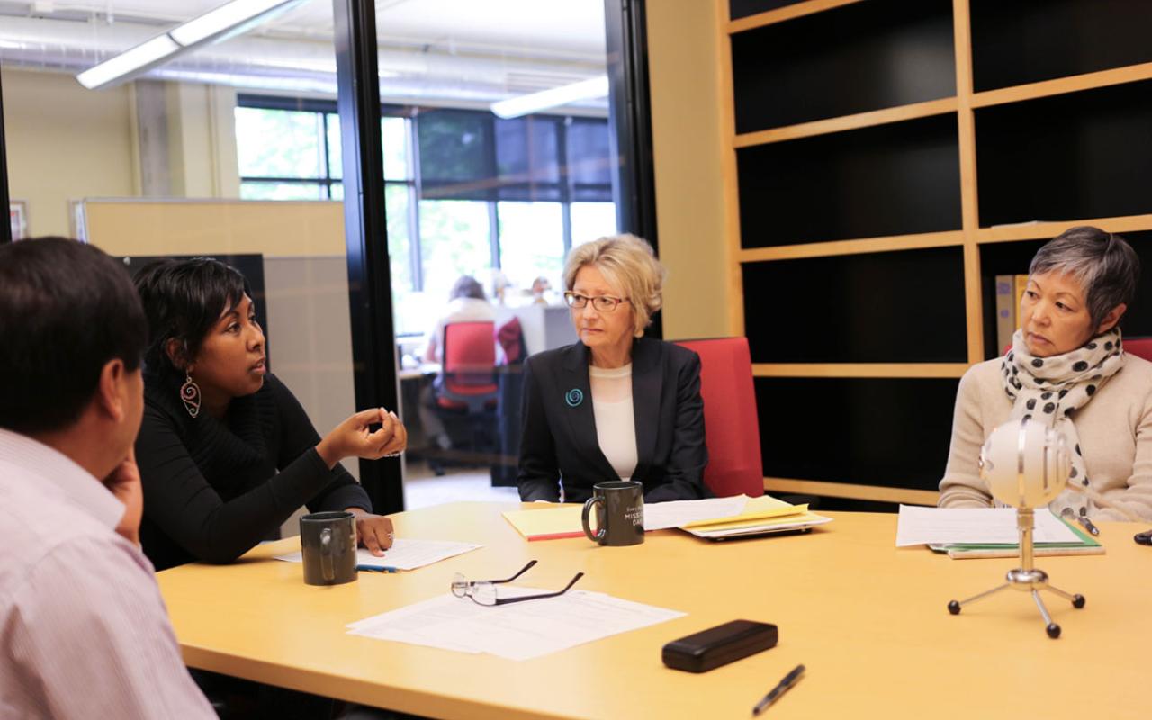 “Philanthropy represents power and privilege distilled,” says Roberta Phillip-Robbins, executive director of MRG Foundation. Phillip-Robbins, wearing black, joined members of the Oregon Immigration and Refugee Funders Collaborative in early May at Meyer Memorial Trust. From left: Roberto Franco, Latino Partnership Program Director at Oregon Community Foundation, Cynthia Addams, CEO of The Collins Foundation and Sally Yee, Building Community program officer at Meyer.