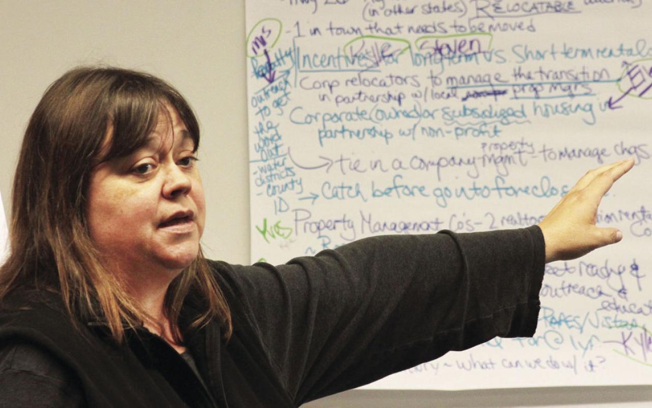 Melissa Carlson-Swanson, Director of the Tillamook branch of Oregon Food Bank, working through the list of housing ideas that are being examined by the Tillamook County Housing Task Force at a June 13 meeting at Tillamook Bay Community College