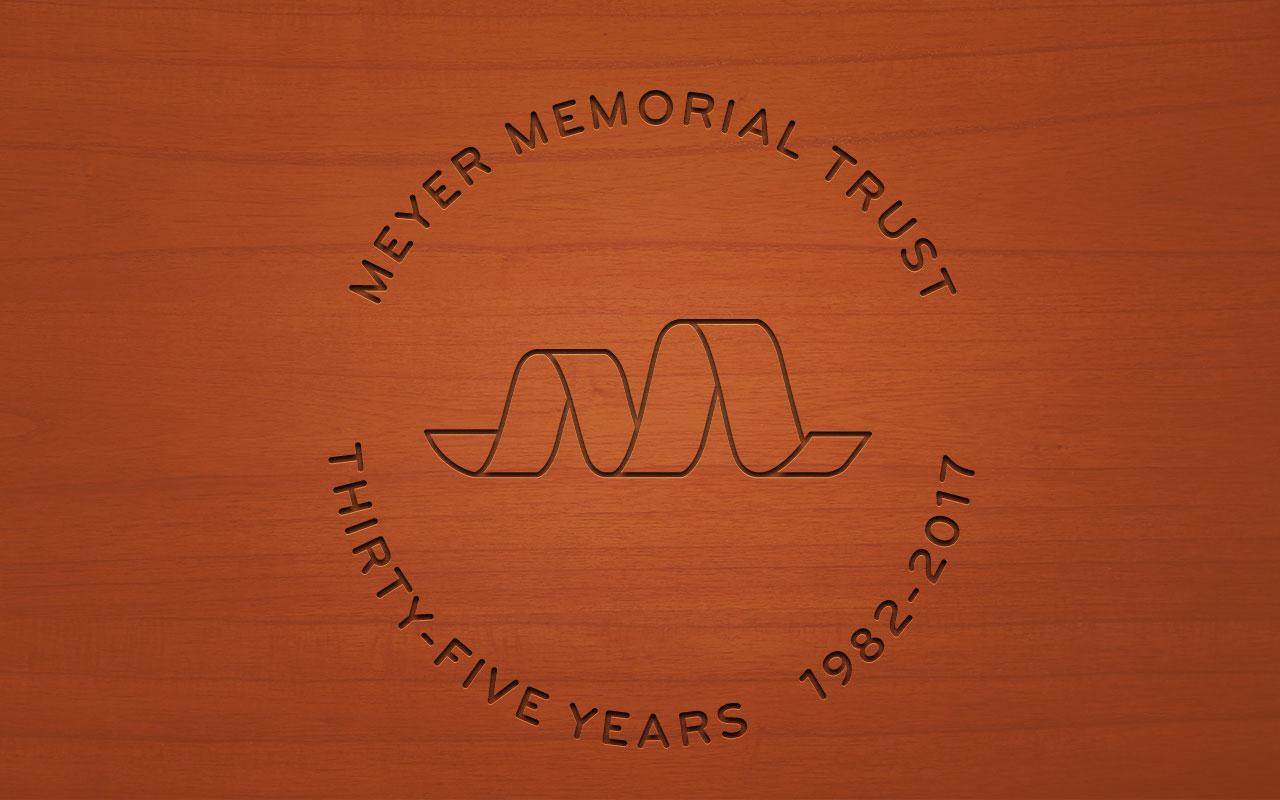 Meyer's logo atop a mahogany background that reads: Meyer Memorial Trust – Thirty-five years 1982-2017