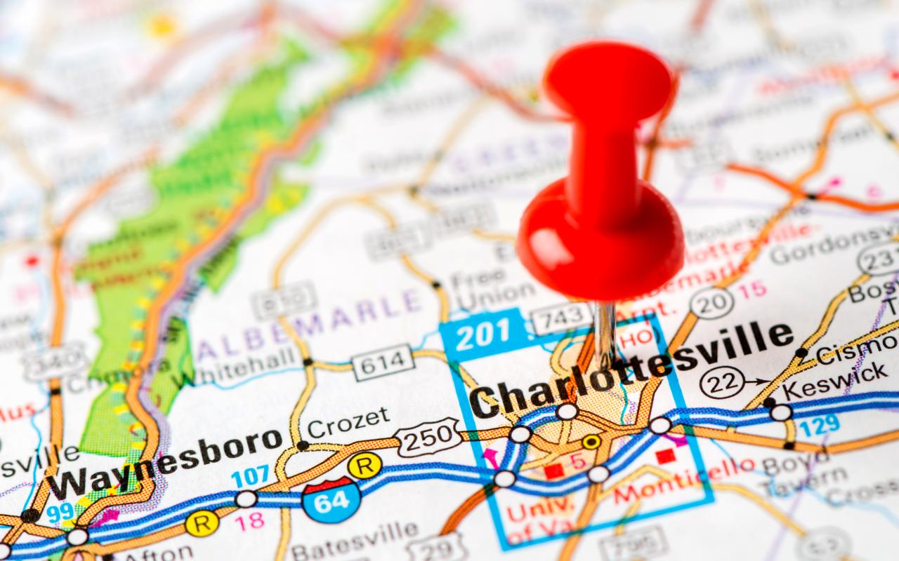 A red pin marks Chrlottesville on a map