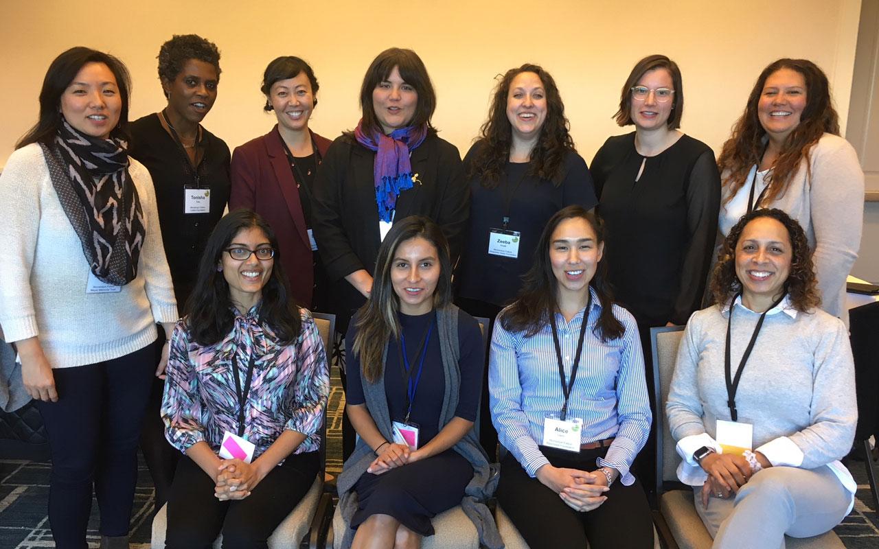 Denise Luk, back, third from the  left, poses with the 2017 cohort of Philanthropy Northwest Momentum Fellows.