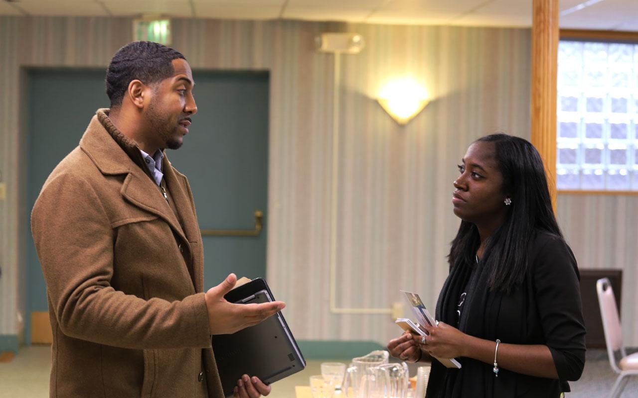 Equitable Education program associate Nicole Kendrick chats at 2017 funding information session with Antonio Jackson, co-founder & Executive Director of Building Blocks To Success.