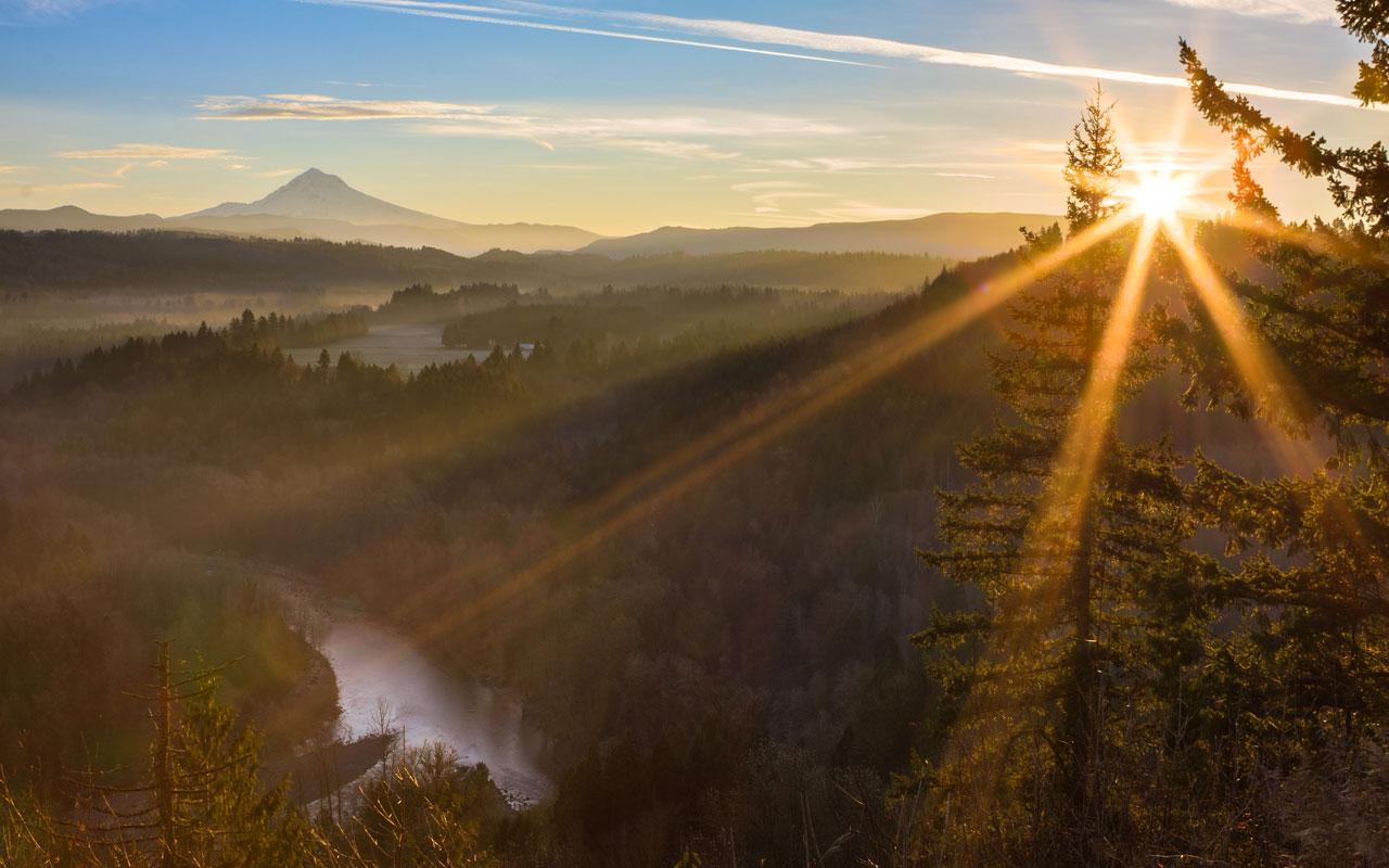 Photo caption: The morning sunrise over a view of Mt. Hood.