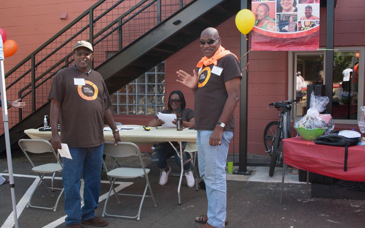 Volunteers and staff at North by Northeast Community Health Center’s community health fair, "Health on the Corner”