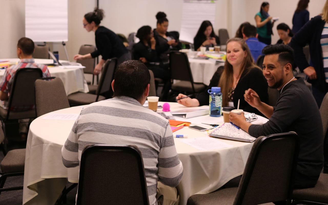 Photo caption: Nonprofit leaders participating in a group activity during a covening for Meyer’s two-year leadership development and learning collaborative