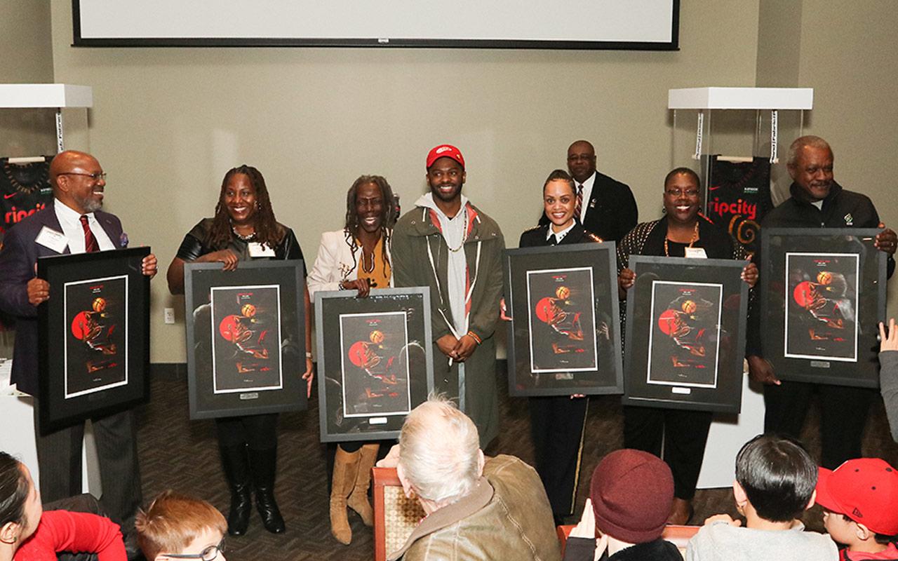 A photo of Trail Blazer honorees, from left to right: Linfield College president Dr. Miles Davis, Meyer's president & CEO Michelle J. DePass, Portland City Commissioner Jo Ann Hardesty, Portland Police Bureau chief Danielle Outlaw, Oregon Supreme Court Justice Adrienne Nelson and Oregon Health & Science University president Dr. Danny Jacobs.
