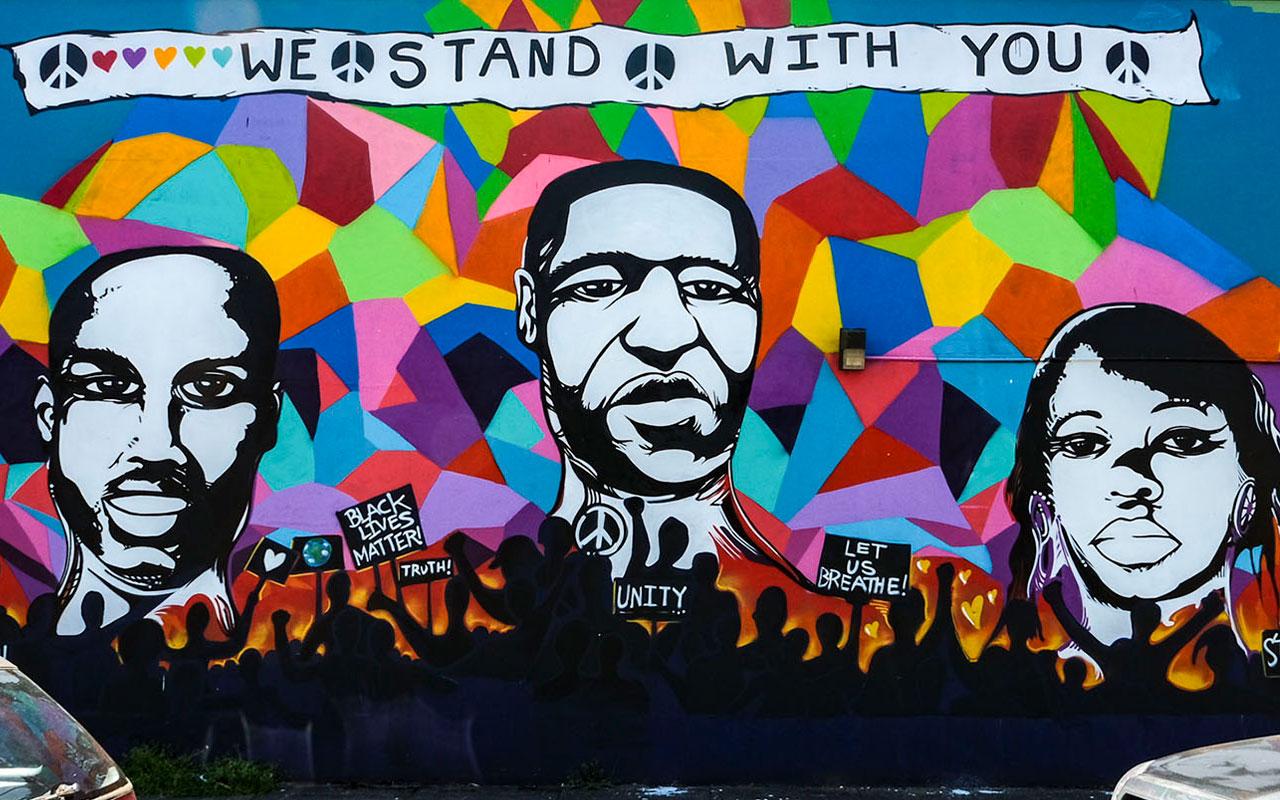 A mural in NE Portland honoring Ahmaud Arbery, George Floyd and Breonna Taylor. | Artist: Christian Grijalva | Photo credit: Tojo Andrianarivo