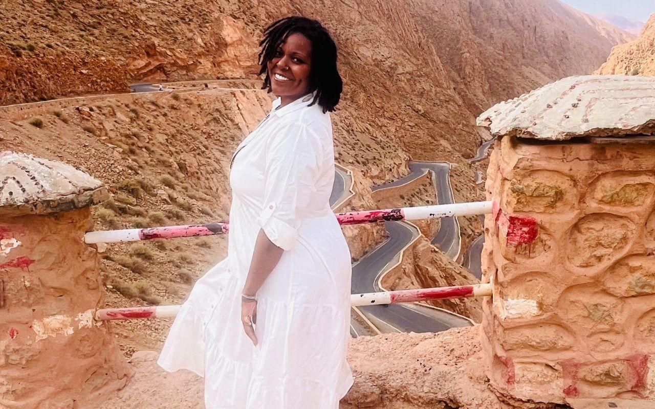Michelle Yemaya Benton, executive director of Black Community of Portland, stands in the Atlas Mountains in Mororcco